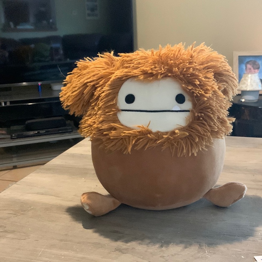 Benny the Brown Bigfoot with heart feet.